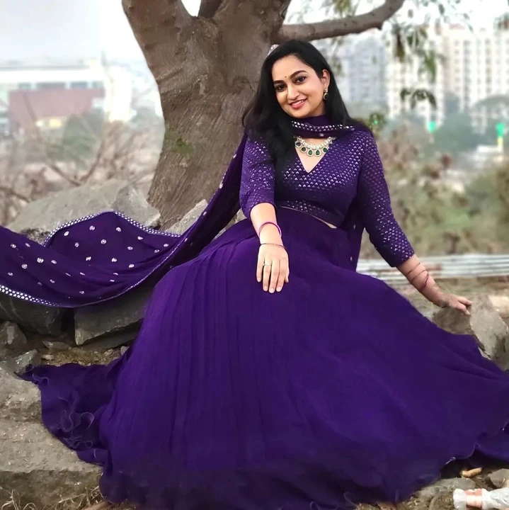 Post image 9039220432

*🌷Lehenga Choli🌷*

wear this beautiful  purple lehenga choli and slaying the look as it create blissful state of mind to feel more preety.

*LNB1522PRL*

*Lehenga(Stitched)*
Lehenga Fabric : Georgette
Lehenga Work : Plain
Waist : Support Up To 42
Lehenga Closer : Drawstring 
Length : 41
Flair : 8 Mtr 
Inner : Micro Cotton                    

*Dupatta*
Dupatta Fabric : Georgette
Dupatta Work : Sequins lace border and Sequins Butties all over
Dupatta Length : 2.5 Mtr 

*Blouse(Unstitched)*
Blouse Fabric : Georgette
Blouse Work : Sequins Embroidery Work
Blouse Length : *1 Meter*

*Package Contain :* Lehenga, Dupatta, Blouse, Drawstring

Weight : 0.720 kg