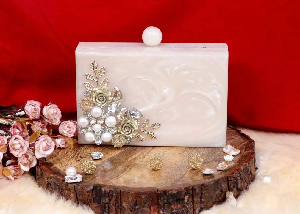 Post image Marble look resin clutches !! 
DM or whatsapp on 9850275754 for queries or orders.