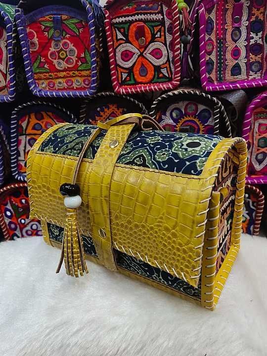 👆🏻👆🏻*Leather hut bag*

Antique kutchi work & mashroo cloth

Material - Mashroo  with leather 
 uploaded by TANVI HANDICRAFT on 11/18/2020