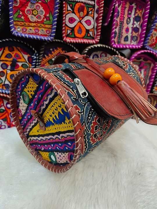 👆🏻👆🏻*Leather hut bag*

Antique kutchi work & mashroo cloth

Material - Mashroo  with leather 
 uploaded by TANVI HANDICRAFT on 11/18/2020