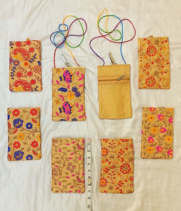  Big size Creame mobile pouch 
Size-8*5" Inch approx
2 pockets available uploaded by TANVI HANDICRAFT on 11/18/2020