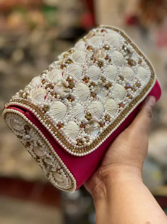 Post image *Beautiful Highlighted Embroidered shells n stone Clutch*💞 ➡️Sling Chain Included➡️ Ready to Dispatch➡️Fit all Size Phone
DM or WhatsApp on 9850275754 for queries and bookings